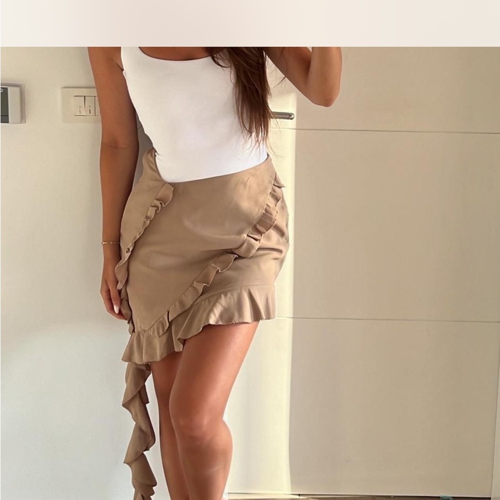 Meshki tan frill mini skirt